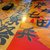 定食の店 牛太郎 - 内観写真:旧店舗の壁面にあった北大関係のポスターがテーブルの下地に