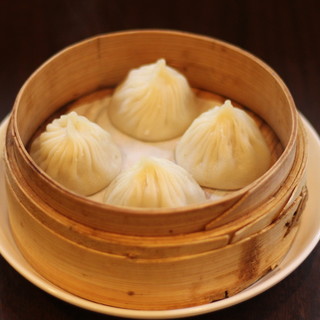 Enjoy the exquisite [handmade Xiaolongbao] prepared by an authentic Shanghai Dim sum chef