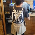 澤田さんの後ろ姿