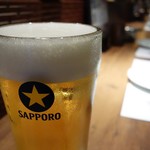 本格炭火焼き鳥＆博多もつ鍋 串たつ - サッポロ黒生ビール