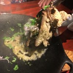 ビストロ・シンバ - サザエのつぼ焼き　香草バターソース