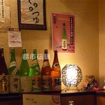 芋がらぼくと - 店内 宮崎産の焼酎が並ぶ