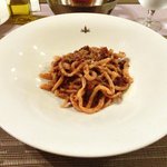 Giglio - パスタ+前菜 1365円 の岩手産短角牛腿肉を赤ワインで煮込んだソース ポロネーニャ風 シエナ伝統パスタ "イ・ピーチ"