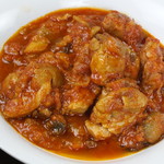 Roman style chicken stew with tomatoes