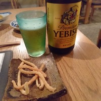 自家製粉石臼挽きうどん 青空blue 本店 - 突き出しはそばならぬうどん煎餅(^^)