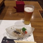 福の舞 - 生ビールと付きだしのフグ皮ポン酢