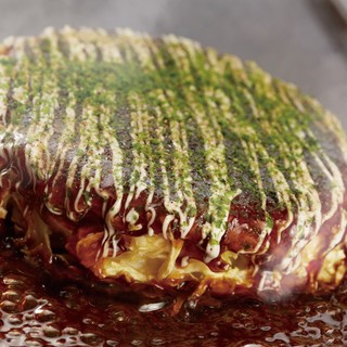 Okonomiyaki- Crispy on the outside, soft on the inside. Delivering the authentic taste of Osaka
