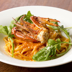 Migratory crab and arugula tomato cream linguine