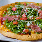 Prosciutto caesar salad pizza