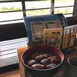 川を見ながら鰻を食らふ