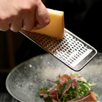 焼肉ホルモンせいご - パルミジャーノをかけて