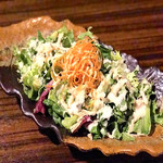 Caesar salad with steamed chicken and avocado