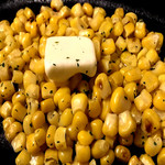 Fried butter corn on iron plate