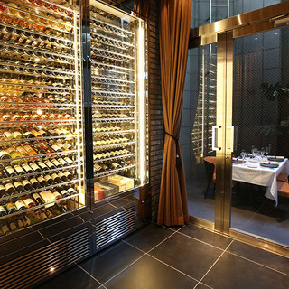 Guests are greeted with a special glass in the huge wine cellar...