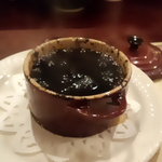 らんぷ亭 - イカスミの煮込み。自家製のみずいかでぷりぷり＆まったり。