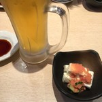 寿司 魚がし日本一 - お通しは、明太子チーズ