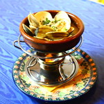 Marine Bar 日の出丸 - 活ハマグリの香草バターアヒージョ