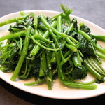 Stir-fried seasonal greens with garlic