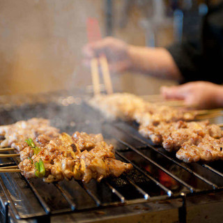 Authentic charcoal-grilled Yakitori (grilled chicken skewers) carefully grilled one by one using Kishu Bincho charcoal.