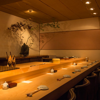 A small sushi restaurant with only 10 seats and an artistic atmosphere