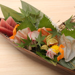 Assortment of four types of sashimi