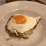 ビリエット - 黒トリュフと目玉焼きの贅沢リゾット 黒トリュフかける前