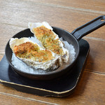 2 Oyster grilled with garlic butter