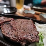 ジャパナイズゲストハウス&バー - 牧草牛ランプ肉ステーキ（230g）1,000円