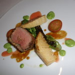 イル ギオットーネ - 仔牛ロースの香草パン粉焼き　含め煮にした筍とドライトマト　木の芽の香りを添えて