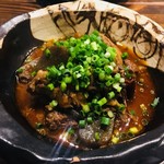 萬的中華 笑龍 - 牛すじのピリ辛煮込み。