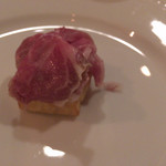 f - 発酵バターと刻んだ松茸を合わせた大和イモのフリットとイノシシの生ハム