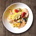 Lemon cream sauce with salmon and colorful vegetables