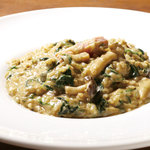 Bacon, mushroom and spinach risotto with porcini cream sauce