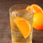 Highball of ripe mango and orange juice