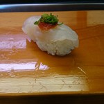 こいし - 河豚の握り。コリッコリで歯ごたえ抜群です。