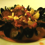 Abaca Restaurant - 魚介をトマトソースとにんにくで