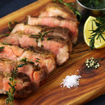 Grilled pork shoulder loin with herbs