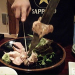 立ち拠り酒場 榮 - 2017.12.1  店員さんが、豚シャシュリークを回しながら切ってくれます☆