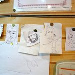 豚の骨 - 壁には沢山の絵が貼ってありました。 これ全て店主さんの力作です。 誰を書いているのかって？？ それは下の写真を見て下さい。