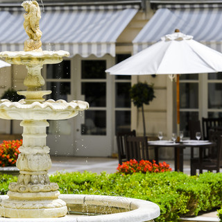 Enjoy your meal while looking out onto the courtyard with a European feel.