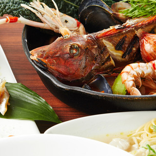 Japanese-Italian Cuisine made with natural fresh fish and local vegetables, accompanied by wine