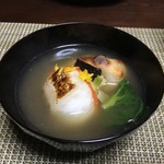 かたつむり - 猪出汁で焼き蕪と丸餅の入ったお雑煮