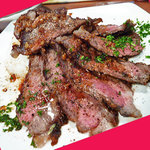 UOKIN PICCOLO - 牛リブロース　の　タリアータ　～焦がしニンニクバターソース～　バターライス添え　　７８０円