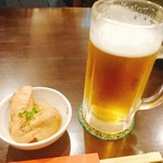 きむら - つきだしの大根と手羽先の煮物。美味しいっ！