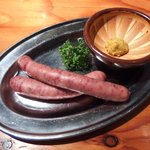 羊肉酒場 悟大 - 粗びきラムソーセージ（702円）