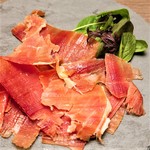 Freshly cut Spanish Prosciutto (jamon serrano)