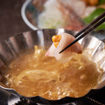 Shining golden sea urchin shabu