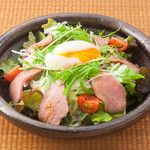 Roast horse and warm egg salad