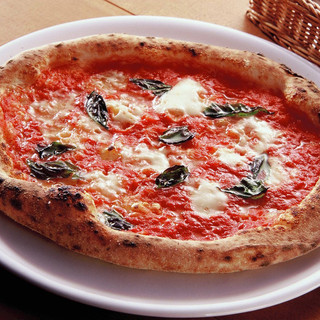 Enjoy our signature Neapolitan pizza baked in a wood-fired oven