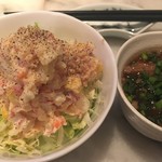 シャンホル - 日替わりポテサラと突き出しのもつ煮